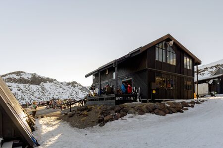 Whakapapa, New Zealand - August 12, 2018: Skiiers line up for chairlift tickets on a busy Saturday at Whakapapa Ski Field, New Zealand.のeditorial素材