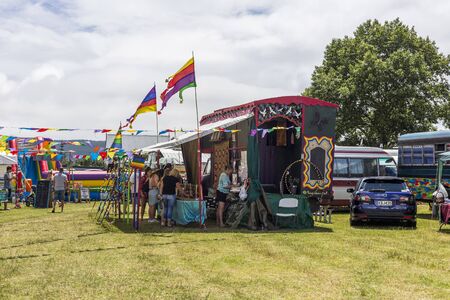 Whangamata, New Zealand - January 02, 2018: Tourists enjoying the live music and family...