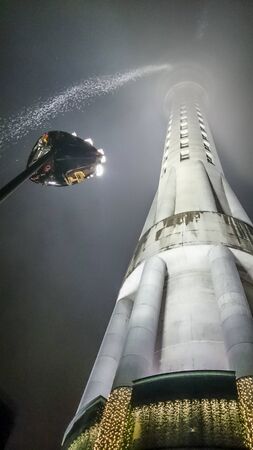 Auckland, New Zealand - August 30, 2015: Sky Tower in a rainy day, New Zealand.のeditorial素材