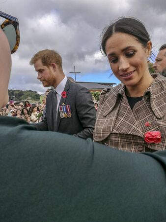 Wellington, New Zealand - October 28, 2018: The Duke and Duchess of Sussex chat with members of the...