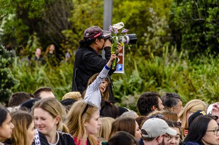 Wellington, New Zealand - October 28, 2018: Crowds wait patiently for royals visiting the Wellington War Memorial in New Zealand.のeditorial素材