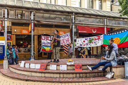 Wellington, New Zealand - November 23, 2018: Carlos Espinoza singing on  Wellington's Chilean community protest against the killing of Mapuche man Camilo Catrillanca, shot by police in Chile.のeditorial素材