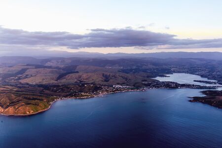 Aerial View from an Airplane Window flying over wellington, New Zealand