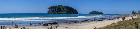 Whangamata, New Zealand -January 02, 2019:  People enjoying a sunny day at the Surf Boat Spectacular in Whangamata beach, New Zealand.のeditorial素材