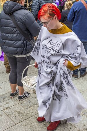 Wellington, New Zealand - October 07, 2019: Supporters of the Extinction Rebellion climate change movement marching along Lambton Quay in Wellington, New Zealand.のeditorial素材