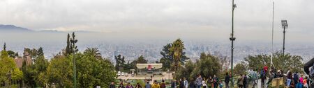 Santiago, Chile - August 18, 2019: Group of people at the top of San Cristobal Hill viewpoint in...