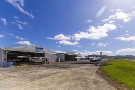 Whangarei, New Zealand - December 28, 2018: Man preparing the Aircraft of Whangarei flying club at...