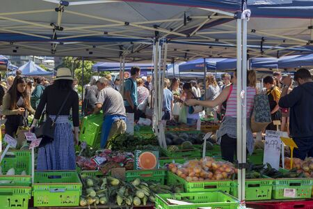 Wellington, New Zealand - February 04, 2018: Sunday Market scene with various product, sellers and...