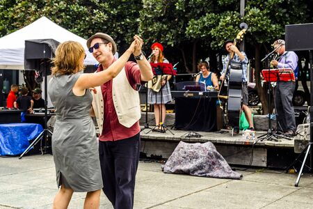 Wellington, New Zealand - January 22, 2018: People dancing with the music of Klezmer Rebs on a public event at the Wellington anniversary in New Zealand.のeditorial素材