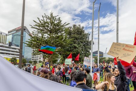 Wellington, New Zealand - October 22, 2019: People demonstrating against the violence and oppression from the government of Sebastian PiÃ±era at Frank Kitts Park in Wellington, New Zealand.のeditorial素材