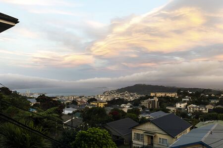 Sunset over Wellington city harbor, New Zealandの写真素材