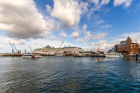 Auckland, New Zealand - January 08, 2020: Cruise ship and catamaran at Auckland Viaduct in New Zealand.のeditorial素材