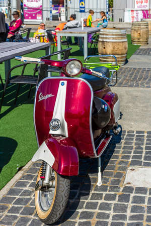 Wellington, New Zealand - February 06, 2018: Beautiful scooter parking on the street on Waitangi Day celebration in Wellington waterfront, New Zealand.のeditorial素材