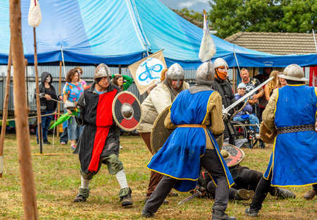 Levin, New Zealand - February 10, 2018: Reenactors battle at a medieval market in Levin showgrounds, New Zealand.のeditorial素材