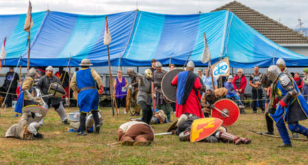 Levin, New Zealand - February 10, 2018: Reenactors battle at a medieval market in Levin showgrounds, New Zealand.のeditorial素材