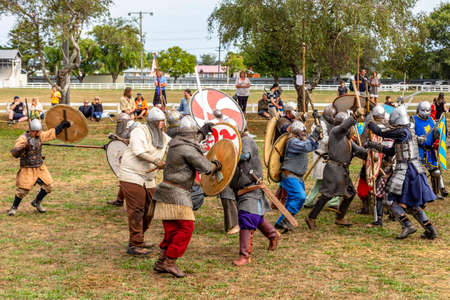 Levin, New Zealand - February 10, 2018: Reenactors battle at a medieval market in Levin showgrounds, New Zealand.のeditorial素材