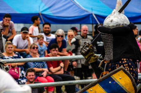 Levin, New Zealand - February 10, 2018: Reenactors battle at a medieval market in Levin showgrounds, New Zealand.のeditorial素材