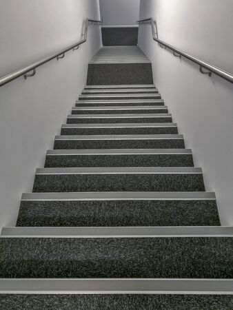 Classic stair with hand railの写真素材