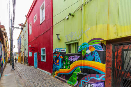 valparaiso, Chile - August 13, 2019: Colourful graffiti on a street in Valparaiso, Chile. Valparaiso Historic centre is a UNESCO world heritage site.のeditorial素材