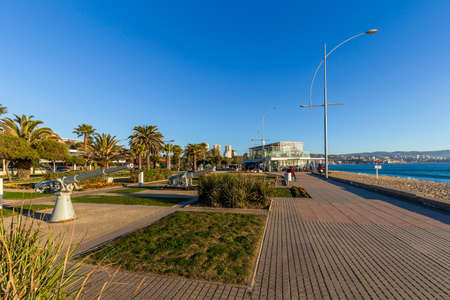 Concon, Chile - August 12, 2019: People enjoying at the large sand dunes on the coast of ConcÃ³n, Chile.のeditorial素材