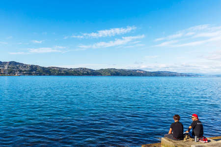 Wellington, New Zealand - December 25, 2020: Oriental Bay on a sunny summer day with people enjoying at the beach.のeditorial素材