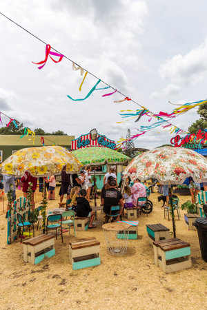 Whangamata, New Zealand - January 04, 2020: People enjoying live music and family entertainment at The Extravaganza Fair in Whangamata, New Zealand.のeditorial素材