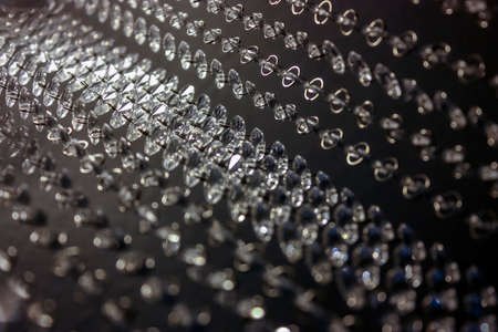 Elegant pendant lamp with many balls in a living roomの写真素材