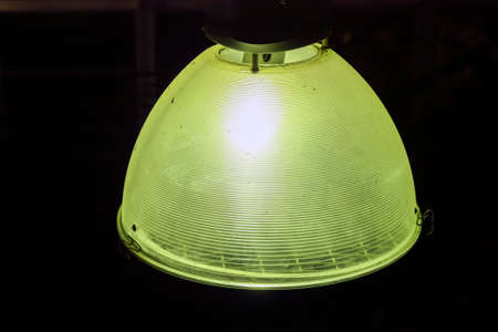 Scarf on display above a wooden logの写真素材