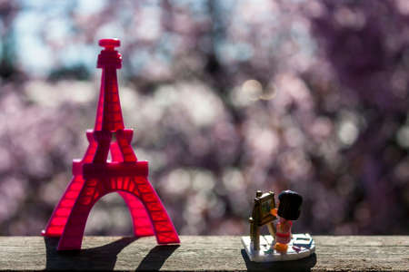 Scarf on display above a wooden logの写真素材