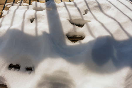 Thaw on the wooden floor terraceの写真素材