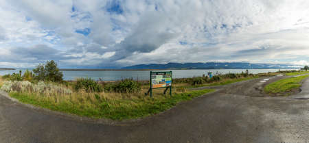 Ngawi Harbour, New Zealand - May 30, 2021: Local beached fishing fleet launched to sea by old rusty bulldozers.のeditorial素材