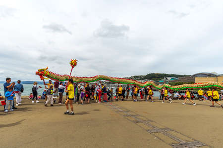 Wellington, New Zealand - February 14, 2021: People celebrating at the Chinese New Year parade in Wellington waterfront, New Zealandのeditorial素材