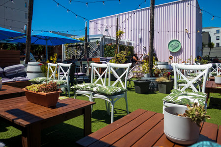 Wellington, New Zealand - January 01, 2022: People enjoying the sunny day at the Arborist Rooftop...