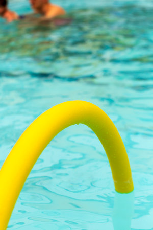 Brightly coloured noodles on the poolの写真素材