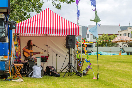 Whangamata, New Zealand - January 03, 2023: Live music and family entertainment at The Original Gypsy Fair in Whangamata, New Zealandのeditorial素材