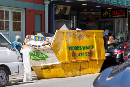 Wellington, New Zealand - March 19, 2023: Urban Wood Waste Container in Street Carpark Scene in Tory...