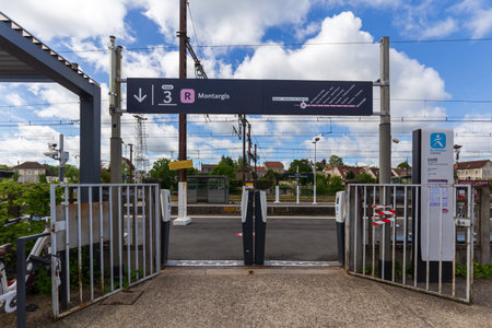 Moret-Veneux-les-Sablons, France - May 06, 2024: Passenger Entrance and Platform at...