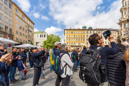 Munich, Germany - May 09, 2024: Tourists Capturing Munich Rathaus Glockenspielのeditorial素材
