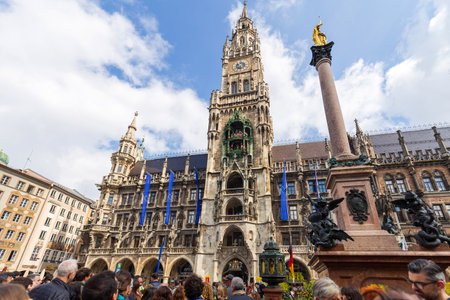 Munich, Germany - May 09, 2024: Crowd at Munich Marienplatz with Neues Rathaus and MariensÃ¤uleのeditorial素材