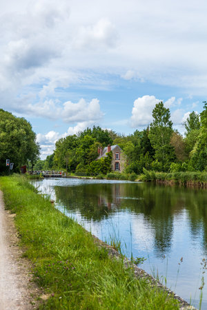 A charming house nestled by the Canal du Loing in Franceの写真素材