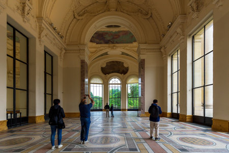 Paris, France - May 19, 2024: Visitors Admiring Grand Hallway in Petit Palais Parisのeditorial素材