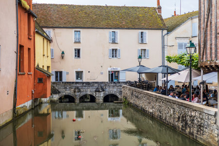 Montargis, France - May 24, 2024: Charming canal-side dining in the historic heart of Montargis, Franceのeditorial素材