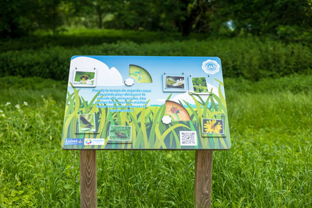 Chalette-sur-Loing, France - May 26, 2024: An educational signboard in a lush green park in Chalette-sur-Loing, France, highlighting the importance of biodiversity and the small creatures that contribute to itのeditorial素材