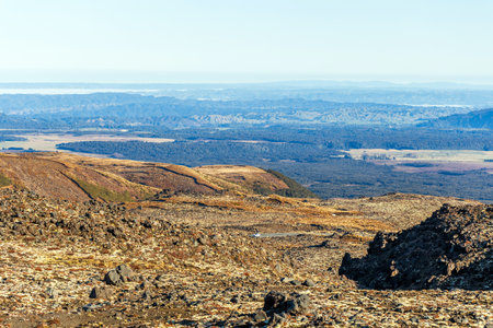 Expansive Volcanic Landscape with Distant Rolling Hillsの写真素材