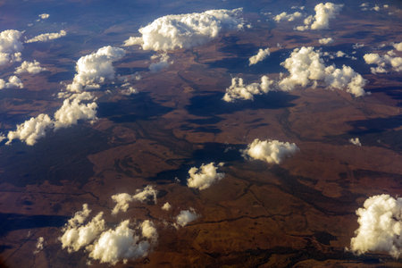 Aerial View of Rural Landscape with Scattered Cloudsの写真素材