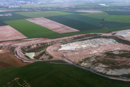Aerial View of Agricultural Fields and Quarry in Franceの写真素材