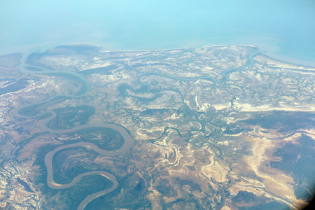 Aerial View of Meandering River and Coastal Terrainの写真素材