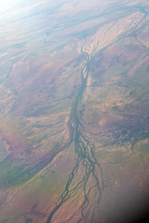 High-Altitude View of Braided River Channels on Earthâs Surfaceの写真素材