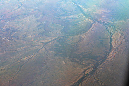 High-Altitude View of Braided River Channels on Earthâs Surfaceの写真素材