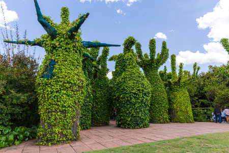 Hamilton, New Zealand - January 04, 2024: Giant topiary sculptures form an enchanted pathway in the Surrealist Garden at Hamilton Gardens, New Zealandのeditorial素材
